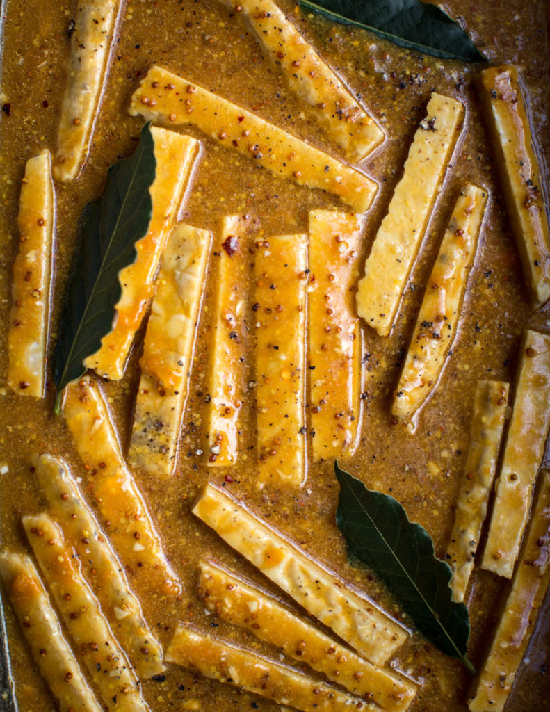 This apricot glazed tempeh recipe is absolutely perfect! Glaze is sweet, tangy, and savory, with just a kick of spice. The texture of the tempeh is firm yet tender with a delightful crunch.