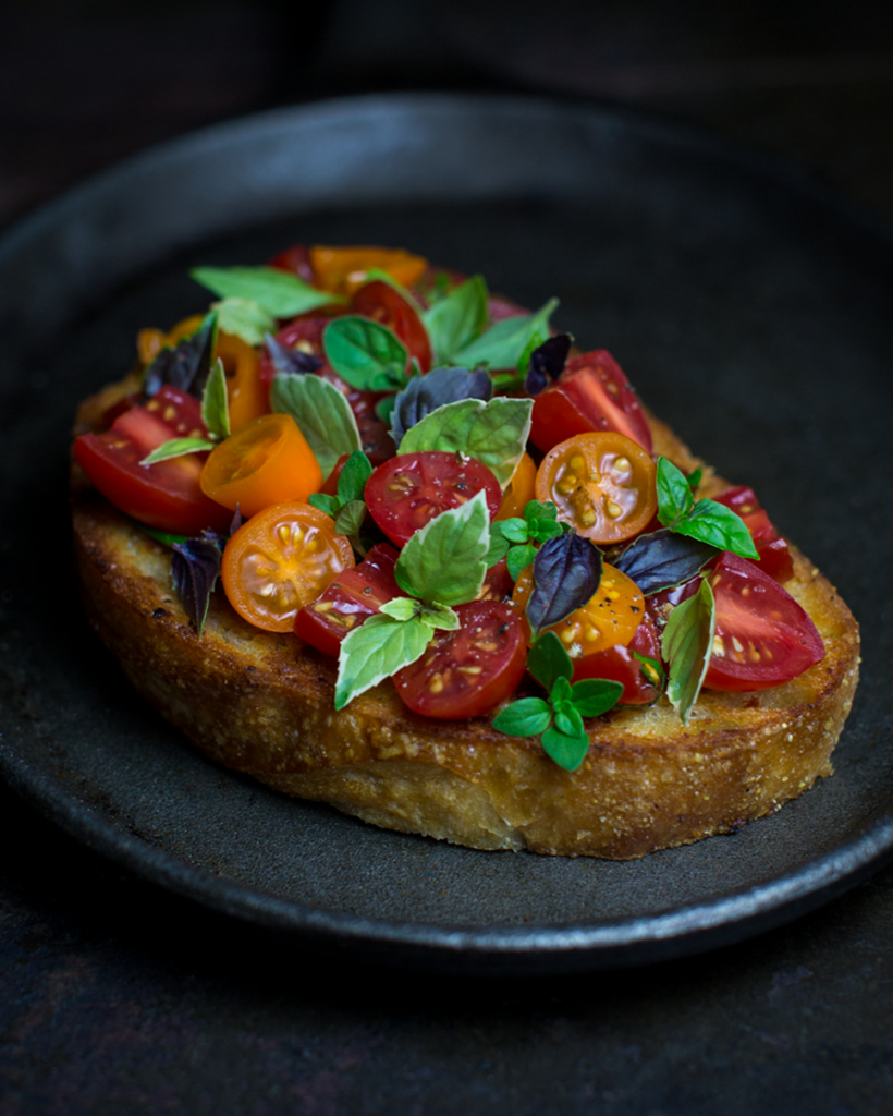 Bruschetta - a delicious and easy recipe for one of my favorite snacks. This is the perfect way to enjoy juicy tomatoes and fresh herbs.