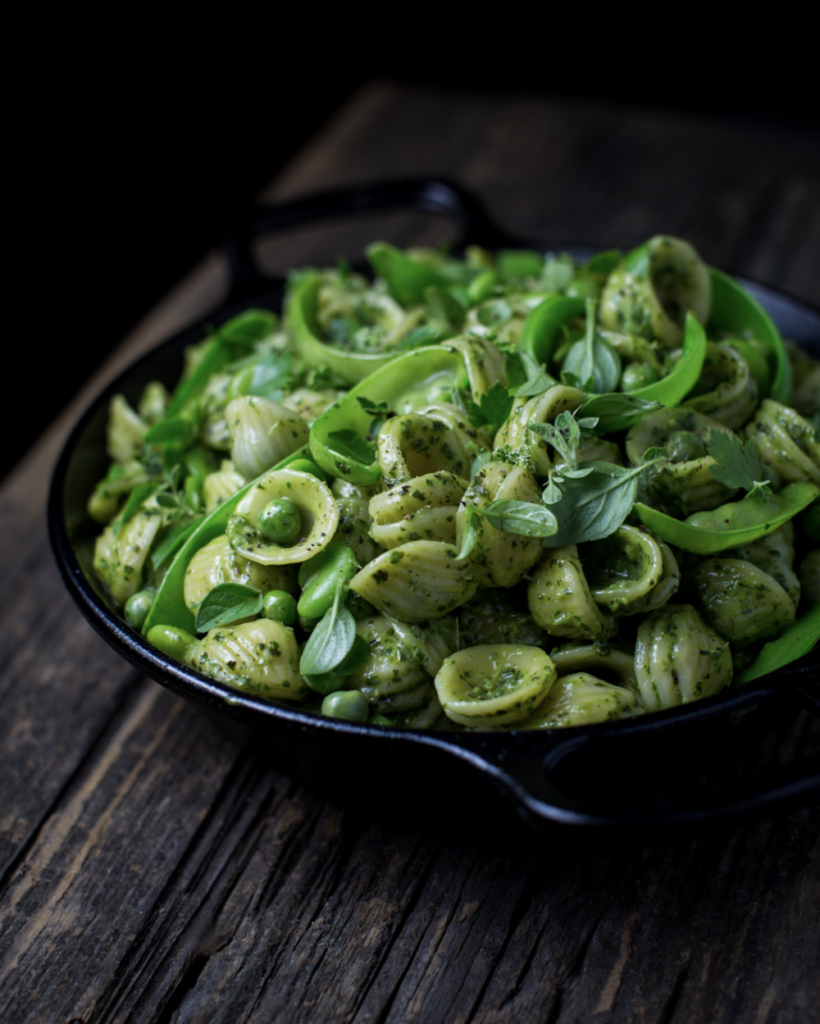 This garden pesto pasta is absolutely divine (if I do say so myself). Fresh English peas, sugar snap peas, freshly picked herbs, and fava beans offering all different shades and varieties of textures!