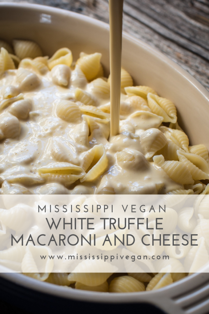 This white truffle macaroni and cheese is thick and creamy. Featuring roasted garlic and white truffle oil for the best mac and cheese ever.