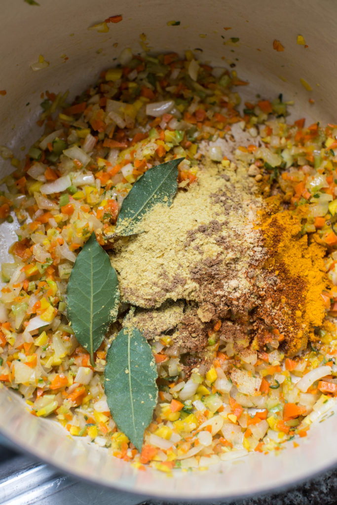 spices and bay leaves in a pot