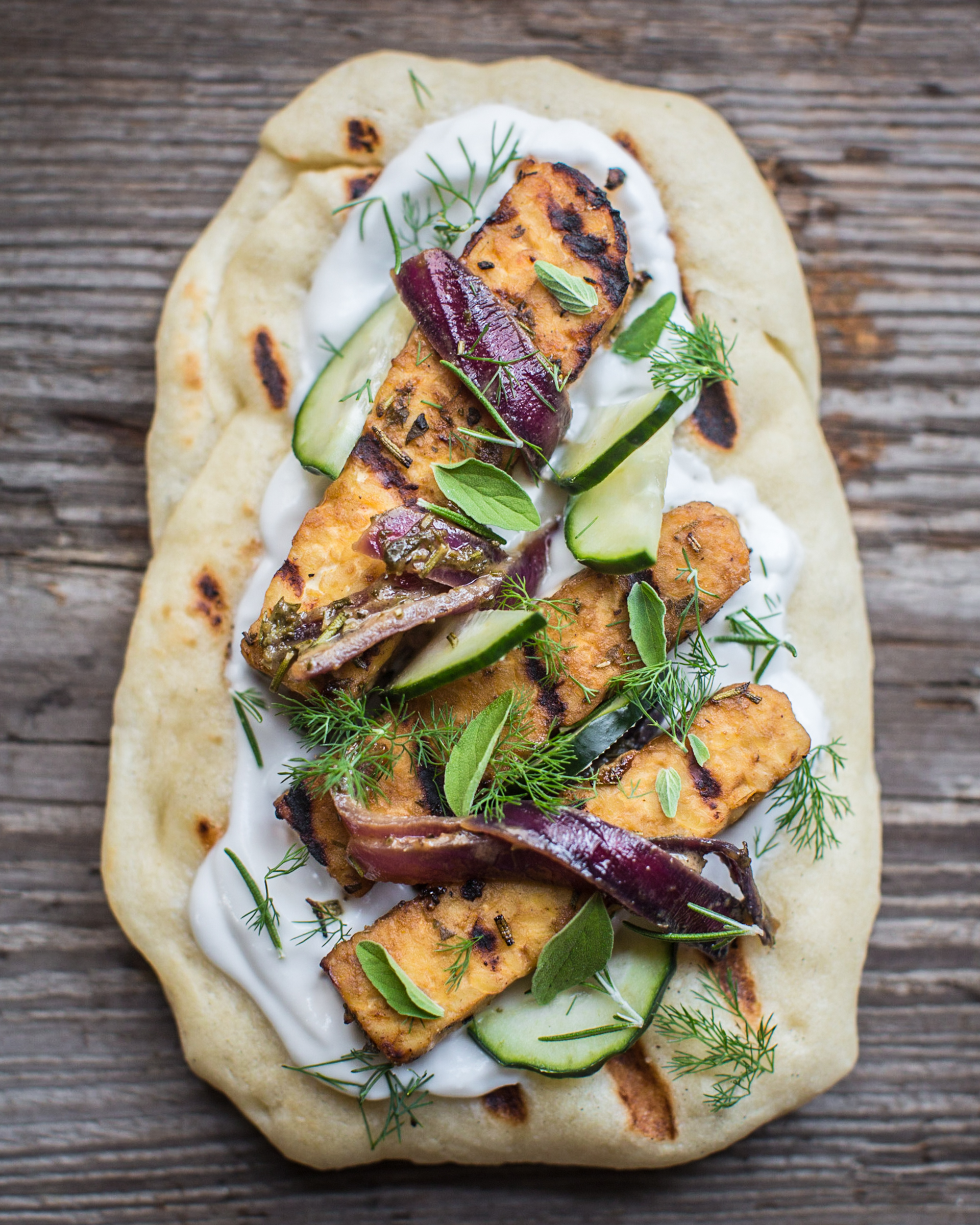 Grilled Rosemary Tempeh Flat Bread on a wooden board
