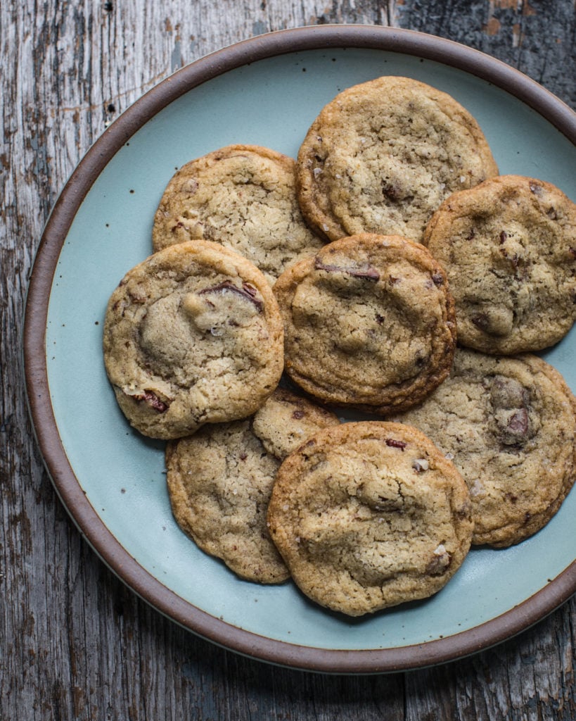 perfect vegan chocolate chip cookies, cookies on a plate
