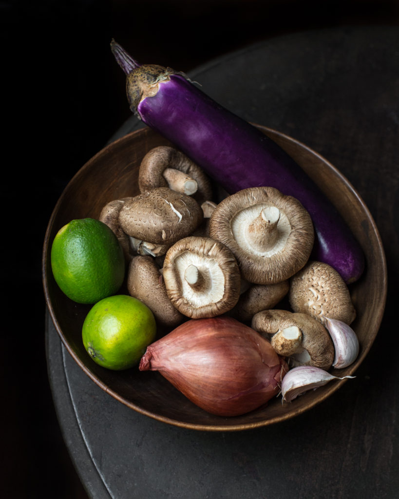 ingredient bowl, Japanese eggplant, limes, mushrooms, shallot, garlic 