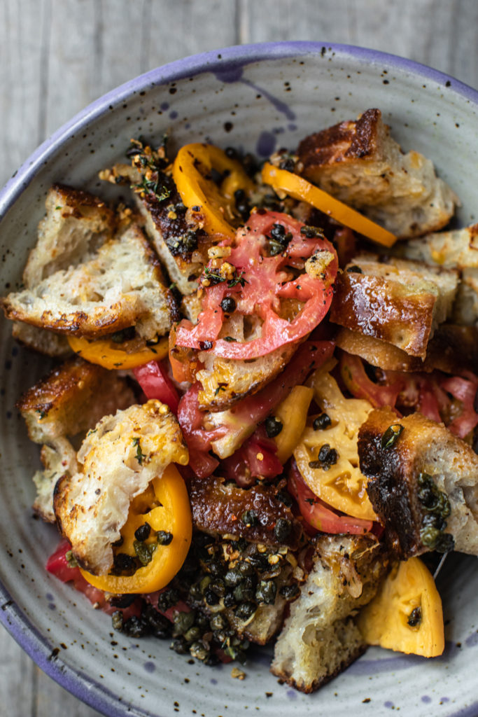 Bowl of fried caper panzanella