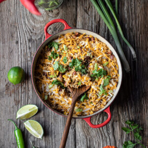 rice and bean bake inside of pot with serving spoon