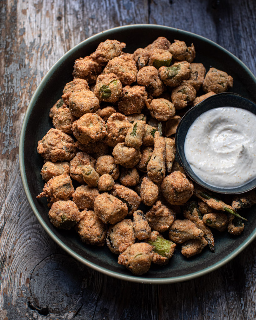Bowl of fried okra with dipping sauce