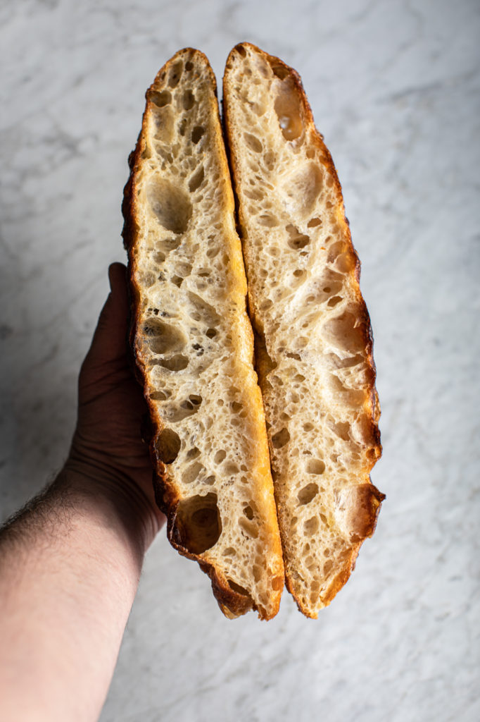 2 cut slices of sourdough held side-by-side