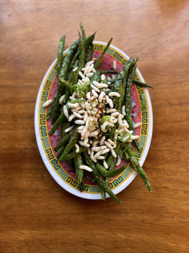 Fried green beans on a colorful plate