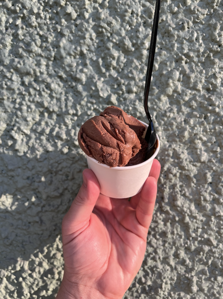 Scoops of ice cream in a bowl with a spoon