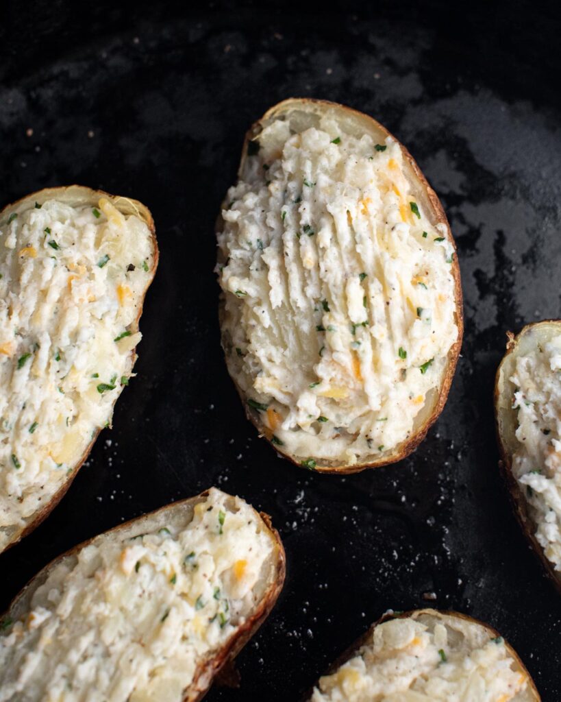 stuffed potatoes skins with the filling before baking