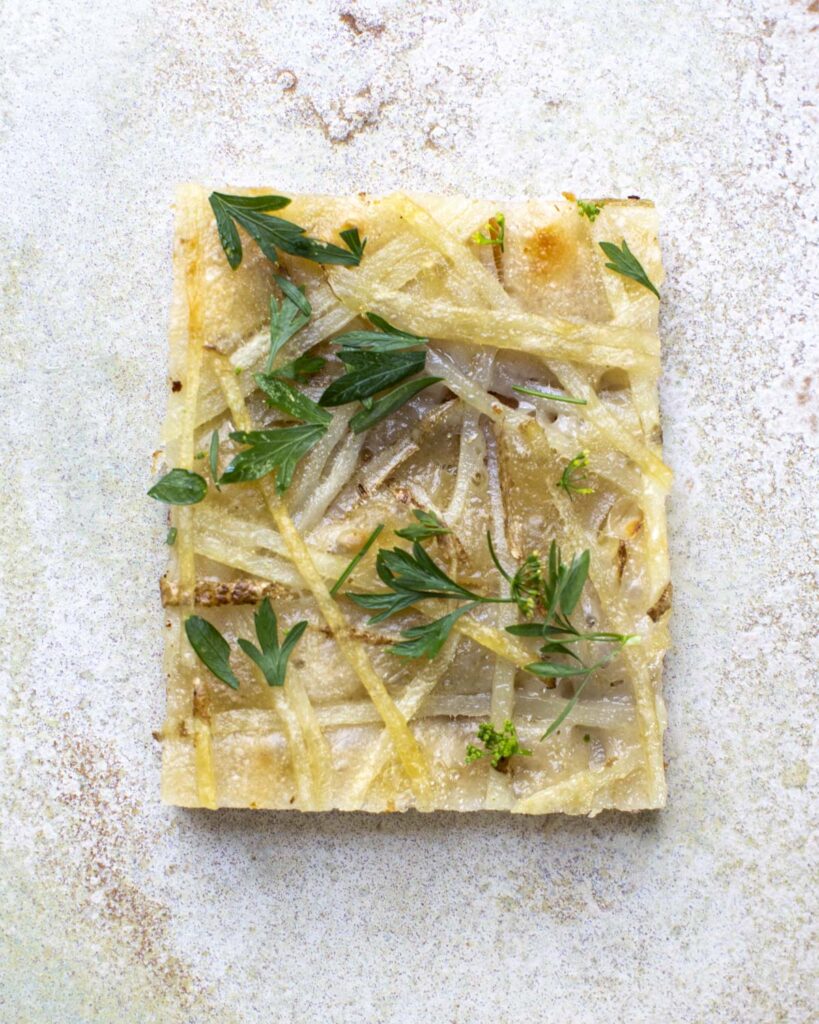 slice of the focaccia genovese on a plate