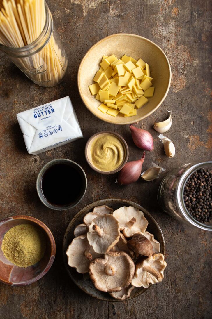 ingredients for vegan mushroom carbonara on wood