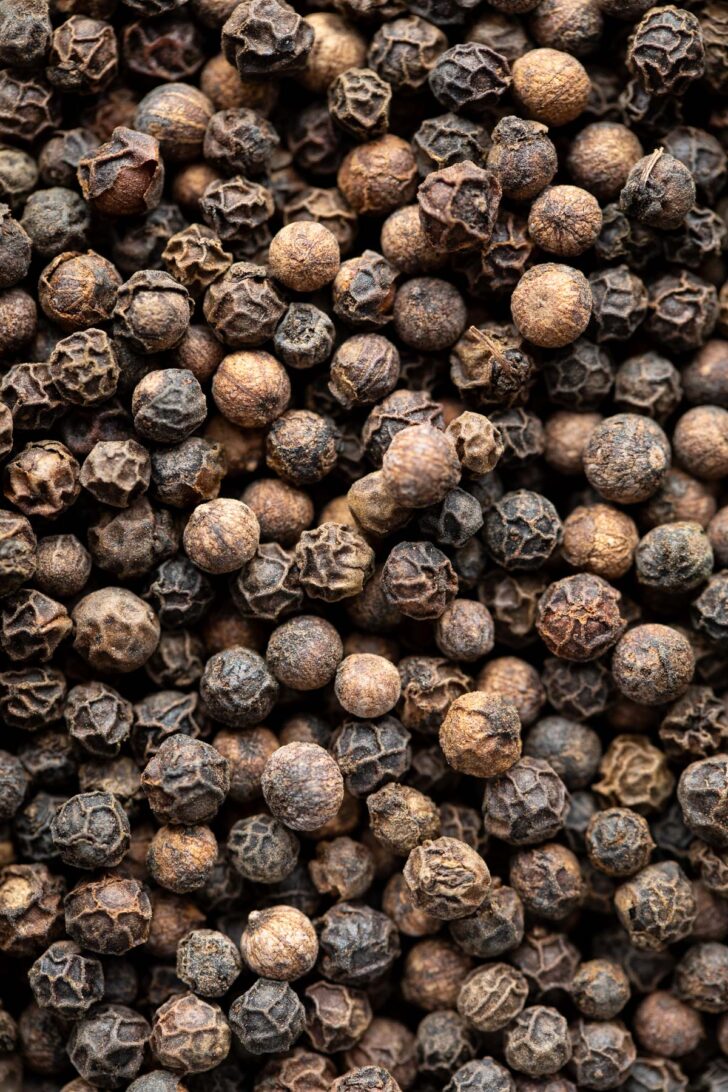 close-up shot of black peppercorns for the vegan mushroom carbonara