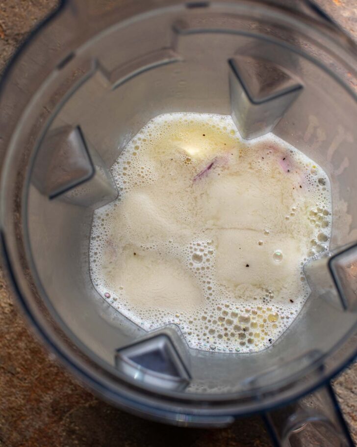sauce ingredients in the blender with hot pasta water added