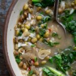 mung bean soup in a bowl with a spoon