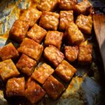 sticky maple mustard tempeh in a skillet